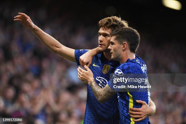 Marcos Alonso of Chelsea celebrates with team mate Christian Pulisic after scoring their sides first goal during the Premier League match between...