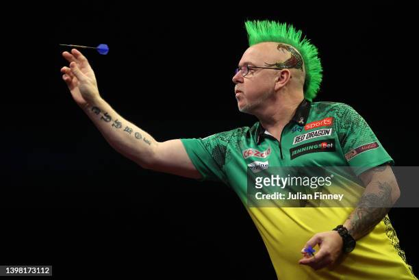 Peter Wright of Scotland throws in the quarter finals during the Cazoo Premier League Darts at The O2 Arena on May 19, 2022 in London, England.