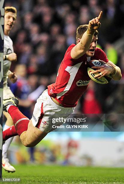 Wales' Scott Williams scores a try during the 6 Nations International rugby union match between England and Wales at Twickenham Stadium, southwest of...