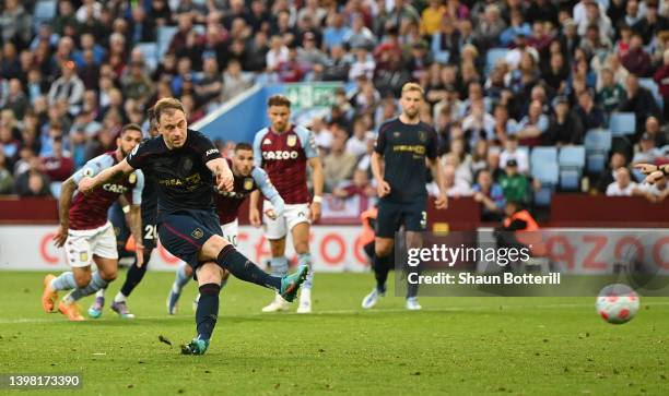 Ashley Barnes of Burnley scores their sides first goal from the penalty spot during the Premier League match between Aston Villa and Burnley at Villa...