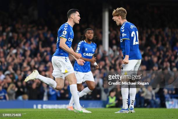 Michael Keane of Everton celebrates with Anthony Gordon after scoring their sides first goal during the Premier League match between Everton and...