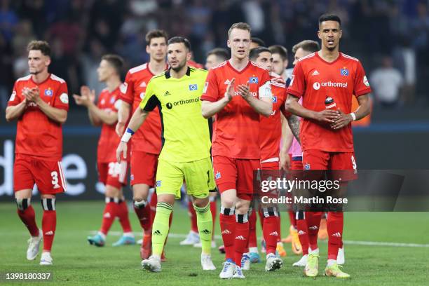 Sebastian Schonlau and team mates of Hamburger SV applaud fans following their sides victory in the Bundesliga Playoffs Leg One match between Hertha...