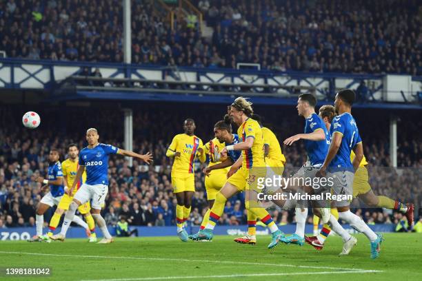Dominic Calvert-Lewin of Everton scores their sides third goal during the Premier League match between Everton and Crystal Palace at Goodison Park on...