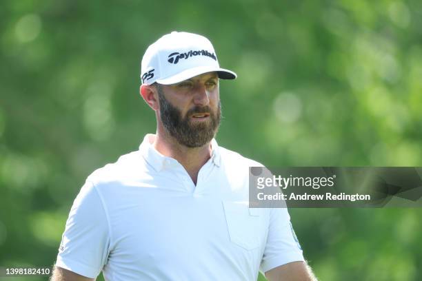 Dustin Johnson of the United States walks on the seventh hole during the first round of the 2022 PGA Championship at Southern Hills Country Club on...