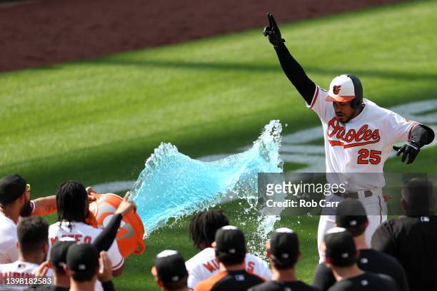 Anthony Santander of the Baltimore Orioles celebrates with teammates after hitting a walk off three run home run to defeat the New York Yankees 9- at...