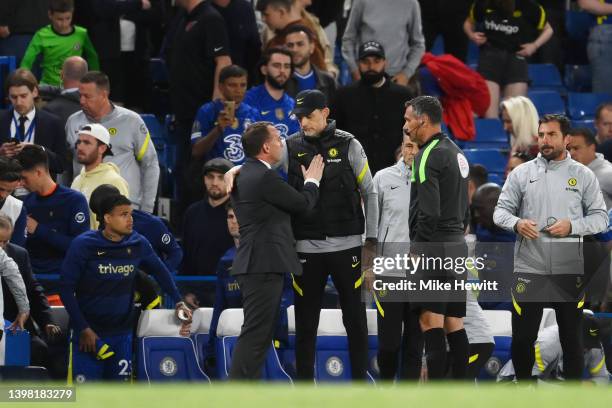 Brendan Rogers, Manager of Leicester City interacts with Thomas Tuchel, Manager of Chelsea after the Premier League match between Chelsea and...