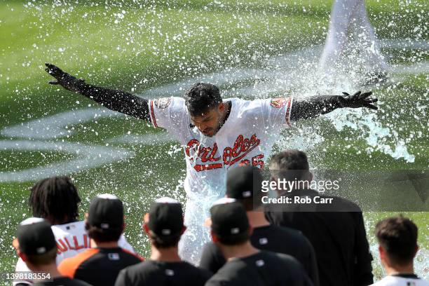 Anthony Santander of the Baltimore Orioles celebrates with teammates after hitting a walk off three run home run to defeat the New York Yankees 9-6...