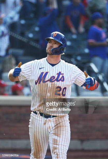 Pete Alonso of the New York Mets celebrates after hitting a walk off two run home run to win the game in ten innings against the St. Louis Cardinals...