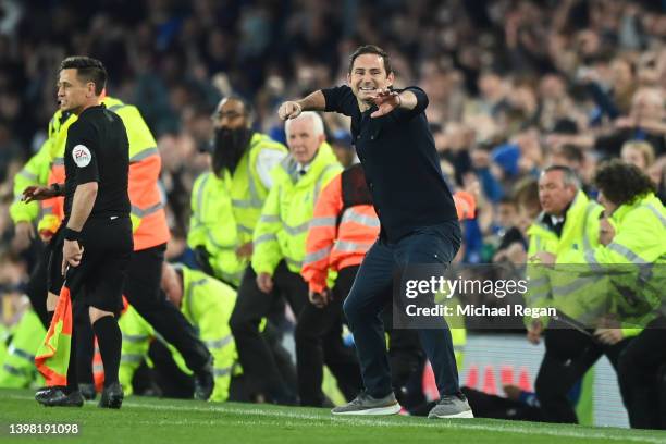 Frank Lampard, Manager of Everton celebrates following their sides victory as they avoid relegation after the Premier League match between Everton...