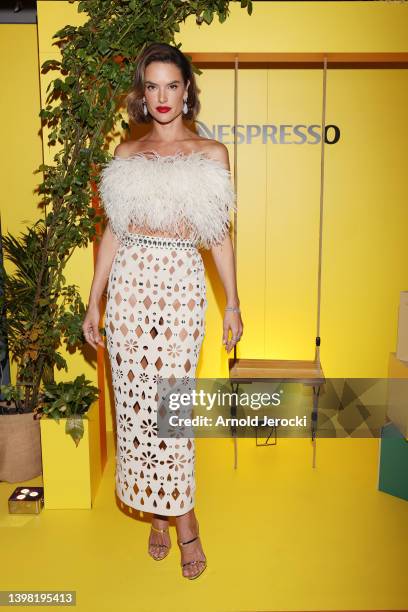 Alessandra Ambrosio attends a dinner by Chef Alessandra Montagne at Nespresso Beach on May 19, 2022 in Cannes, France.