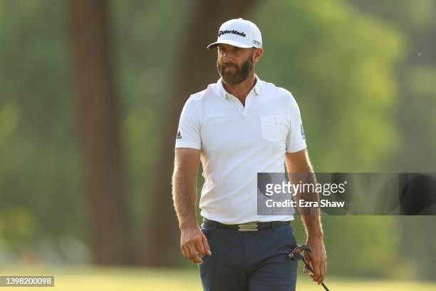 Dustin Johnson of the United States walks on the 18th green during the first round of the 2022 PGA Championship at Southern Hills Country Club on May...