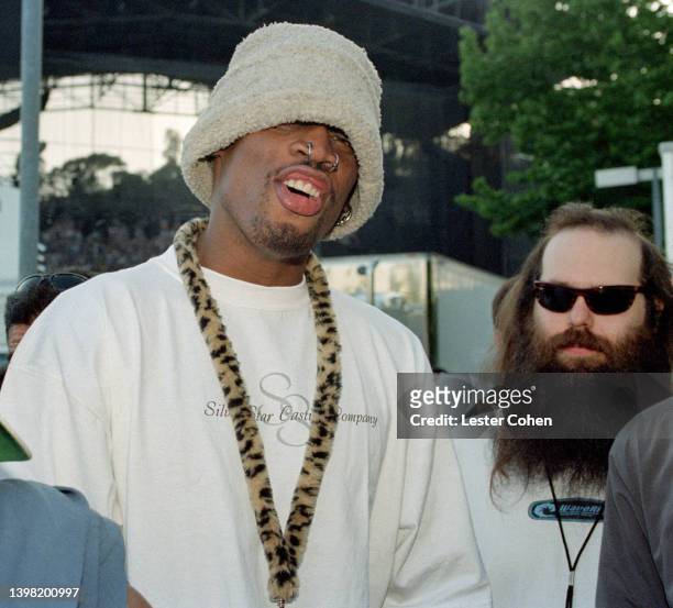 Basketball player Dennis Rodman, of the Los Angeles Lakers and American record producer and former co-president of Columbia Records Rick Rubin, stand...