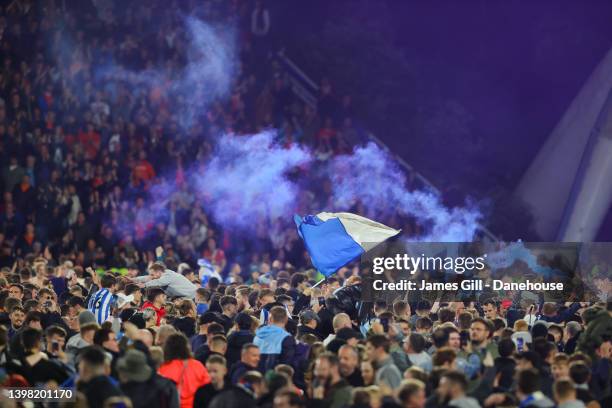 Huddersfield supporters invade the pitch following the Sky Bet Championship Play-Off Semi Final 2nd Leg match between Huddersfield Town and Luton...