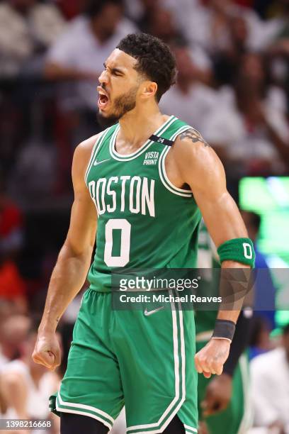 Jayson Tatum of the Boston Celtics celebrates a three pointer and a foul against the Miami Heat during the second quarter in Game Two of the 2022 NBA...