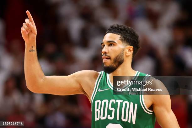 Jayson Tatum of the Boston Celtics reacts to a play during the second quarter against the Miami Heat in Game Two of the 2022 NBA Playoffs Eastern...