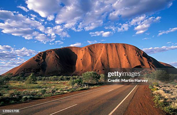 road to ayers rock (uluru), kata tjutu national park, australia - uluru stock pictures, royalty-free photos & images