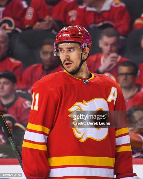 Mikael Backlund of the Calgary Flames in action against the Edmonton Oilers during Game One of the Second Round of the 2022 Stanley Cup Playoffs at...