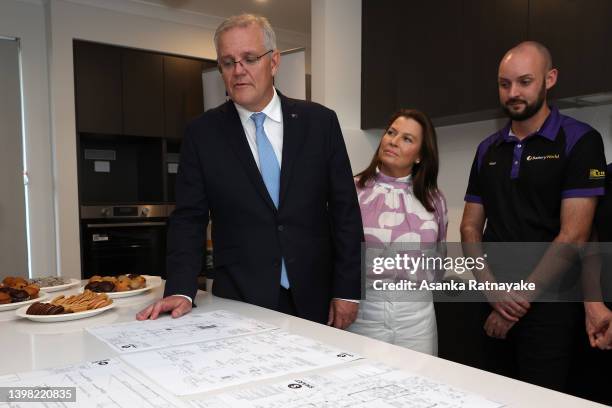 Prime Minister Scott Morrison and wife Jenny Morrison visit a residential property under construction at a housing estate in Jindalee, which is in...