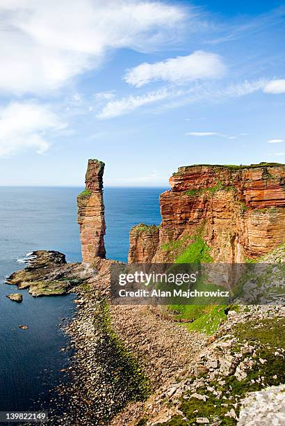 the old man of hoy, a 450 tall sea stack on the westerhn coast of isle of hoy. orkney islands, scotland, uk - scottish coastline stock pictures, royalty-free photos & images
