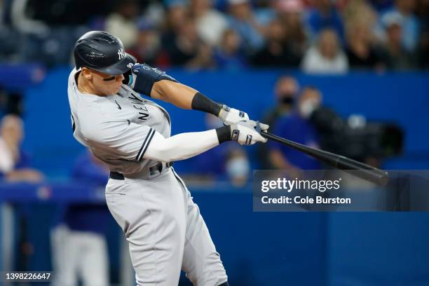Aaron Judge of the New York Yankees hits a solo home run in the sixth inning of their MLB game against the Toronto Blue Jays at Rogers Centre on May...