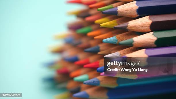 color pencils close up with copyspace - colored pencil stockfoto's en -beelden