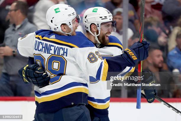 David Perron of the St Louis Blues celebrates with Pavel Buchnevich after scoring a goal against the Colorado Avalanche in the third period during...