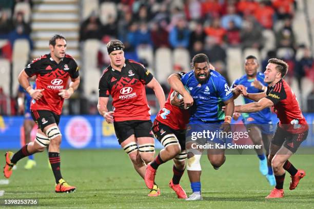 Mesulame Dolokoto of Fijian Drua charges forward during the round 14 Super Rugby Pacific match between the Crusaders and the Fijian Drua at...