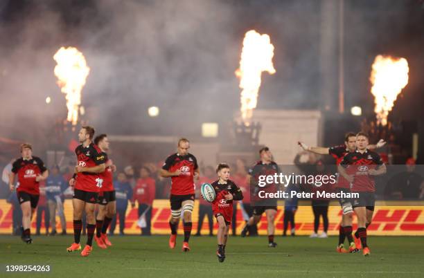 The Crusaders take the field during the round 14 Super Rugby Pacific match between the Crusaders and the Fijian Drua at Orangetheory Stadium on May...