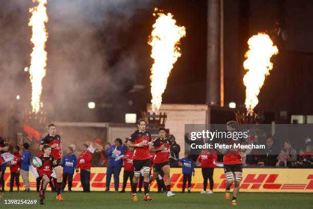 The Crusaders take the field during the round 14 Super Rugby Pacific match between the Crusaders and the Fijian Drua at Orangetheory Stadium on May...