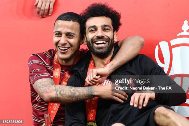 Thiago Alcantara and Mohamed Salah of Liverpool celebrate by wearing a face mask of Mo Salah after their sides victory during The FA Cup Final match...