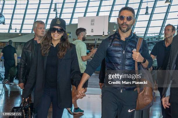 Actress Eva Longoria and Jose Antonio Baston are seen leaving the 75th annual Cannes film festival at Nice Airport on May 20, 2022 in Nice, France.