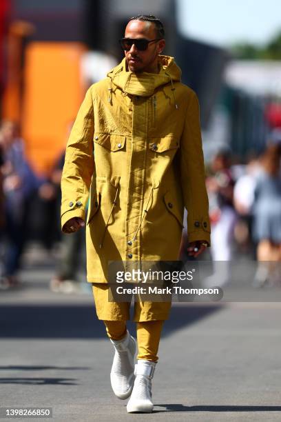Lewis Hamilton of Great Britain and Mercedes walks in the Paddock prior to practice ahead of the F1 Grand Prix of Spain at Circuit de...