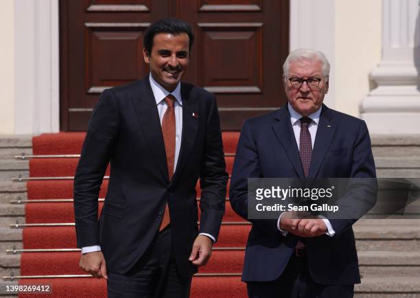 German President Frank-Walter Steinmeier welcomes Sheikh Tamim bin Hamad al Thani, Emir of Qatar, at Schloss Bellevue on May 20, 2022 in Berlin,...