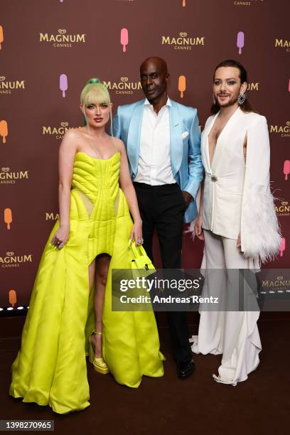 Naomi Jon, Bruce Darnell and Riccardo Simonetti attend the 'Classics can be remixed' Magnum event on May 19, 2022 in Cannes, France.