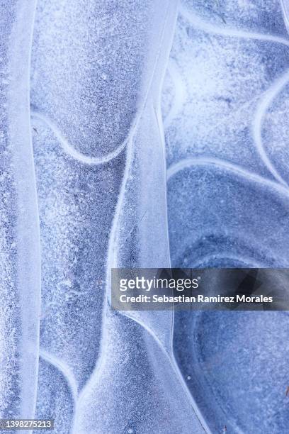 abstract shapes in frozen water - scratched ice stock pictures, royalty-free photos & images