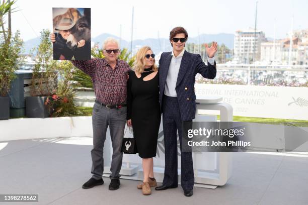 Producer Jeremy Thomas, Ewa Piaskowska, and Lorenzo Zurzolo attend the photocall for "Eo" during the 75th annual Cannes film festival at Palais des...