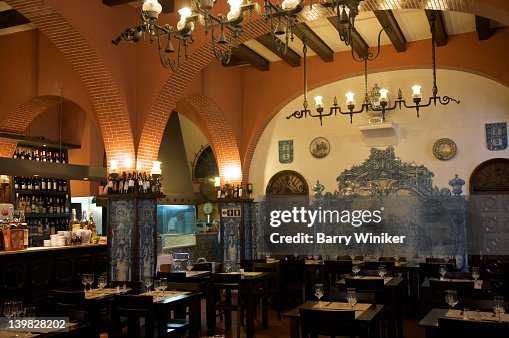 Restaurante Leao D'Ouro, typical Portuguese restaurant interior with brick archways and Portuguese historical blue and white glazed tiles, Lisbon, Portugal