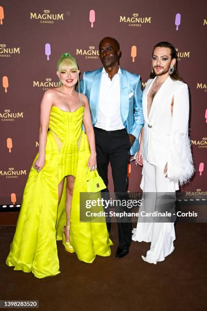 Naomi Jon , Bruce Darnell and Riccardo Simonetti attend the 'Classics can be remixed' Magnum event on May 19, 2022 in Cannes, France.