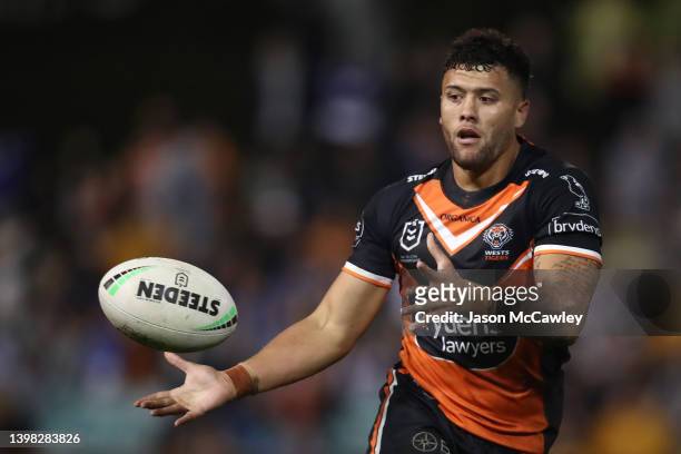 Stardford To'a of the Tigers passes during the round 11 NRL match between the Wests Tigers and the Canterbury Bulldogs at Leichhardt Oval on May 20,...