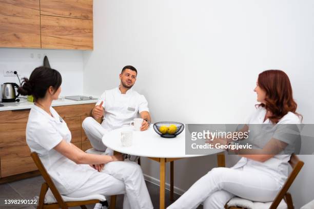 doctors at coffee break - cafeteria stock pictures, royalty-free photos & images