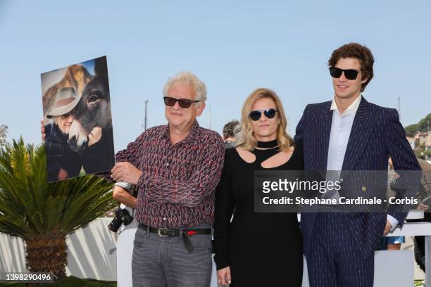 Jeremy Thomas, Ewa Piaskowska and Lorenzo Zurzolo attend the photocall for "Eo" during the 75th annual Cannes film festival at Palais des Festivals...