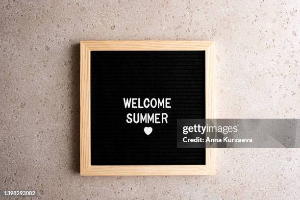 close-up of letter board with text “welcome summer”, top view. hello summer concept. - welcome june stock pictures, royalty-free photos & images