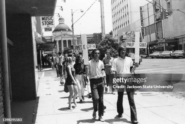 Students from Millsaps college marching on Capitol Street towards the Governor's Mansion in Jackson, Mississippi to protest the shootings at the...