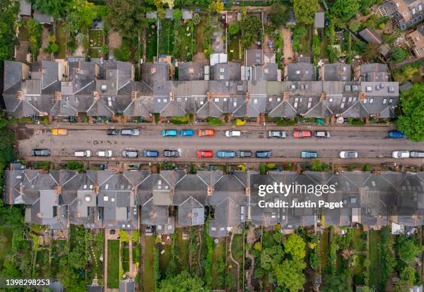 drone view over a row of terraced houses - suburb park stock pictures, royalty-free photos & images