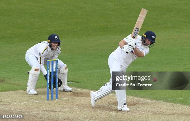 Yorkshire batsman Adam Lyth in batting action watched by wicketkeeper Michael Burgess during the LV= Insurance County Championship match between...