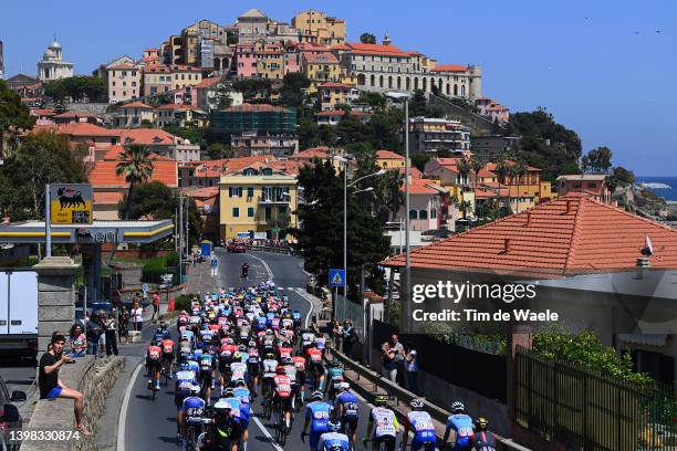 General view of the peloton passing through Imperia city landscape during the 105th Giro d'Italia 2022, Stage 13 a 150km stage from Sanremo to Cuneo...