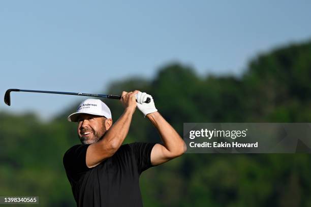 Erik Compton plays his shot from the 11th tee during the first round of the Visit Knoxville Open at Holston Hills Country Club on May 12, 2022 in...