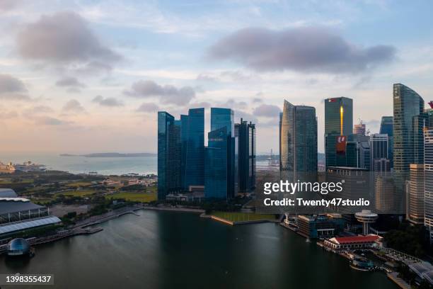 aerial view of singapore skyline and financial district - singapore financial district stock-fotos und bilder