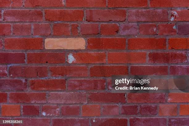 a brick in the wall - mismatch fotografías e imágenes de stock