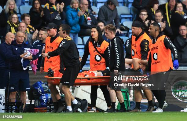 Elliott Stooke of Wasps is stretchered off the pitch after an injury during the Gallagher Premiership Rugby match between Wasps and Sale Sharks at...